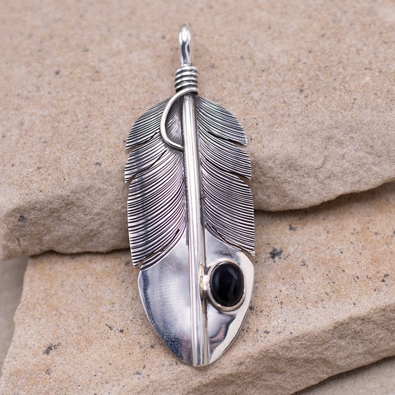 Feather pendant with black onyx