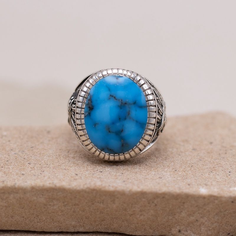 Large Oval Spiderweb Turquoise Ring w/ Chief Motifs