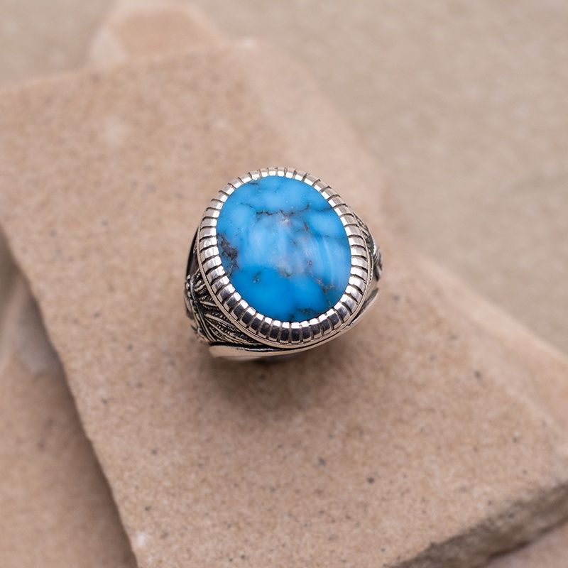 Large Oval Spiderweb Turquoise Ring w/ Chief Motifs