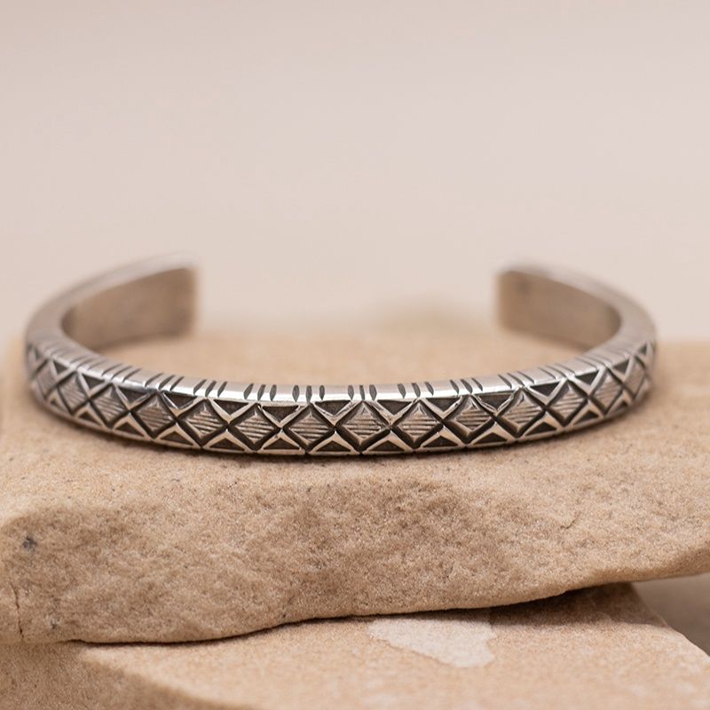 Ingot cuff with Diamond stamps by Calvin Martinez