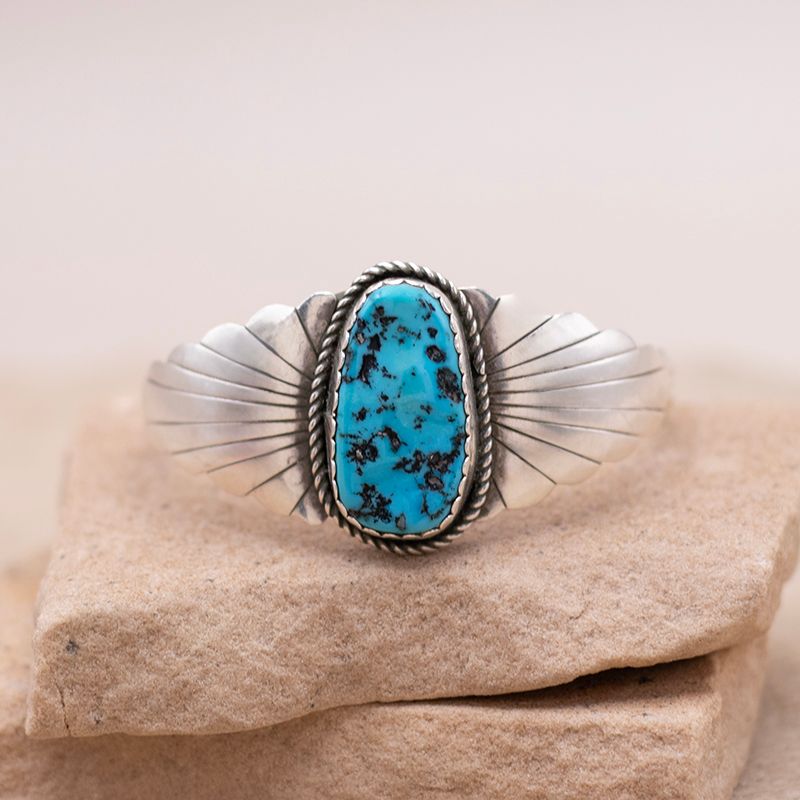 Single Stone Turquoise Cuff with Radiant Stamp Design