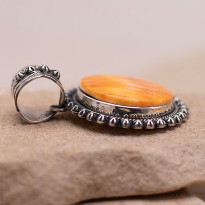 Round Orange Spiny Oyster Shell Pendant with Star Detail