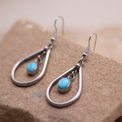 Open Oval with Circular Turquoise Stone at the Center