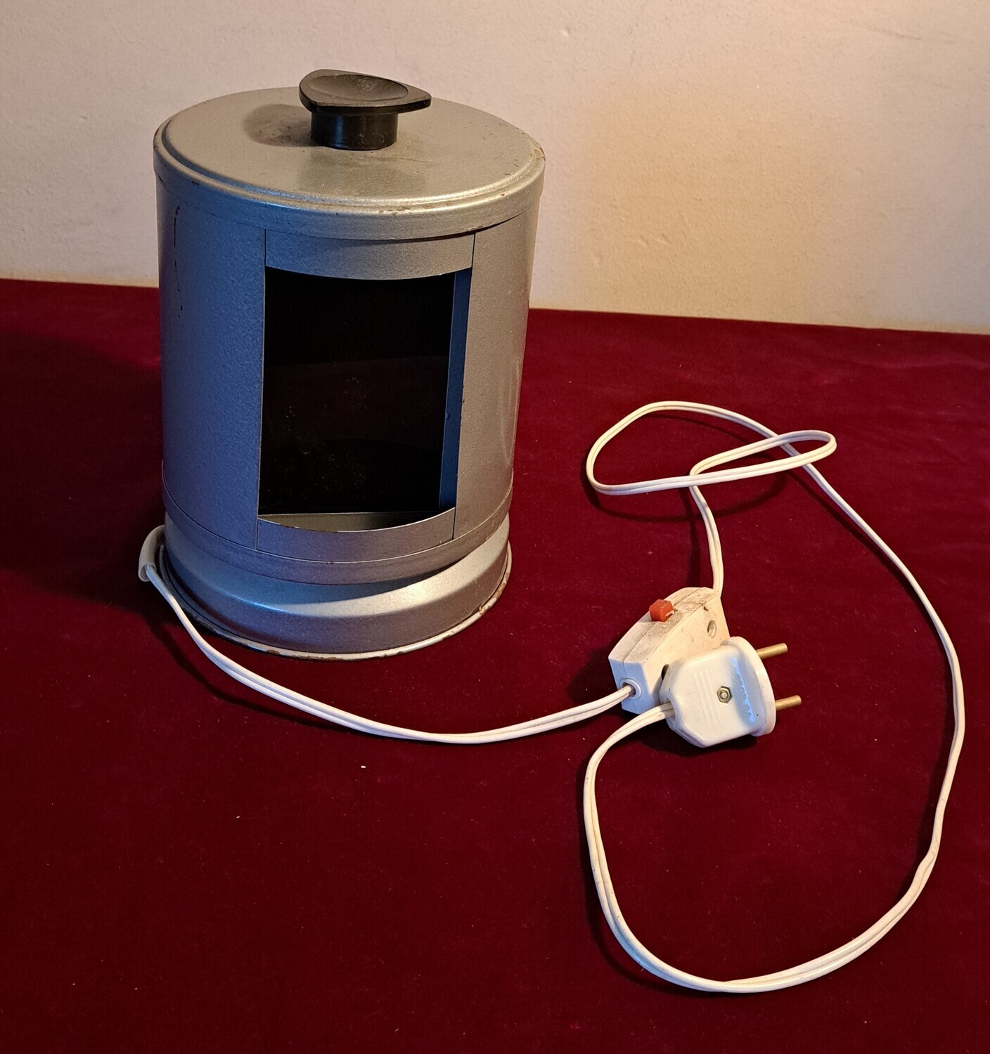 Lamp met ronddraaiend groen - rood glas