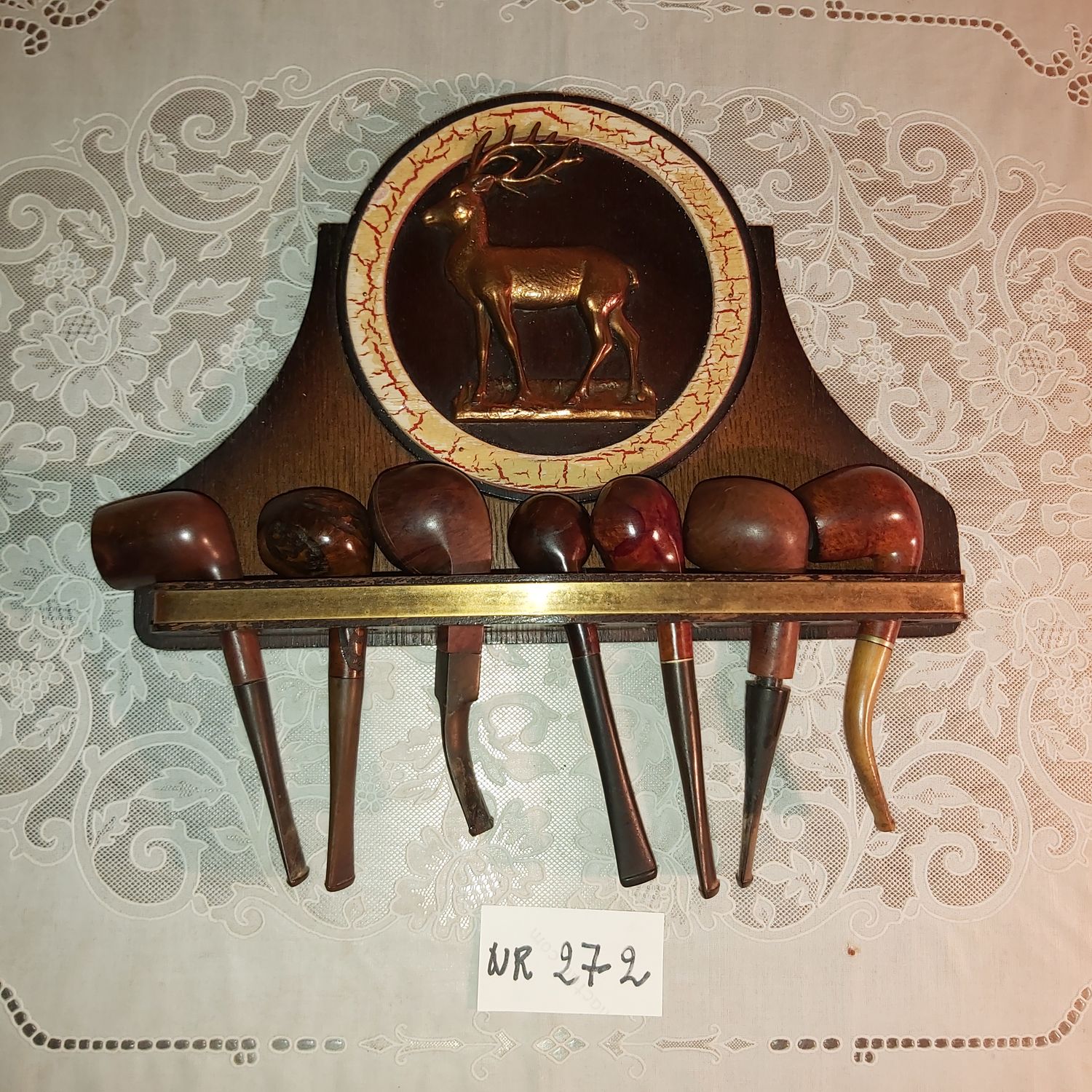 Pijpenrek met hert / pipe rack with pipes and deer image