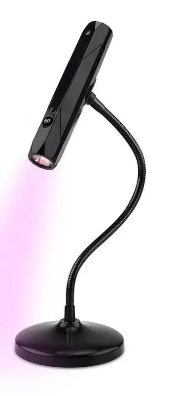 Kleine LED-lamp voor het uitharden van soft gel tips, compact en krachtig, zorgt voor snelle en gelijkmatige nagelverharding. Perfect voor thuisgebruik of salons.