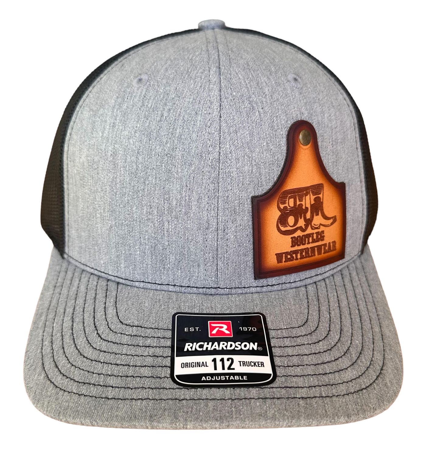 Leather Cow Tag Trucker Hat