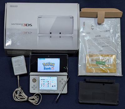 Custom White Nintendo 3DS original model with 64 GB SD card, charger, and box