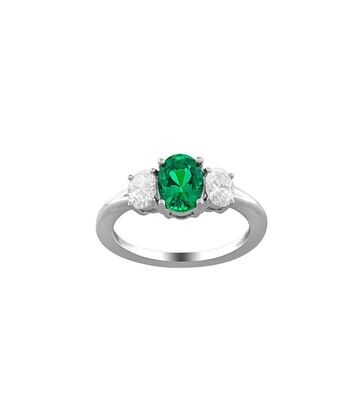 OVAL EMERALD AND DIAMOND RING
