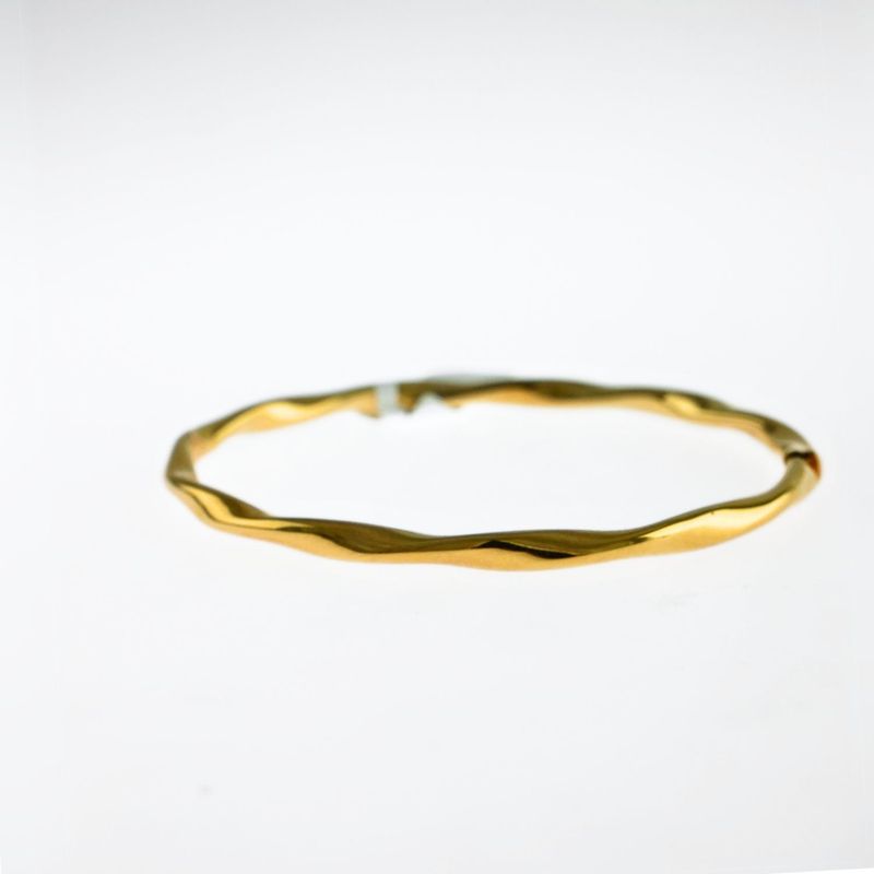 POLISHED TWIST BANGLE