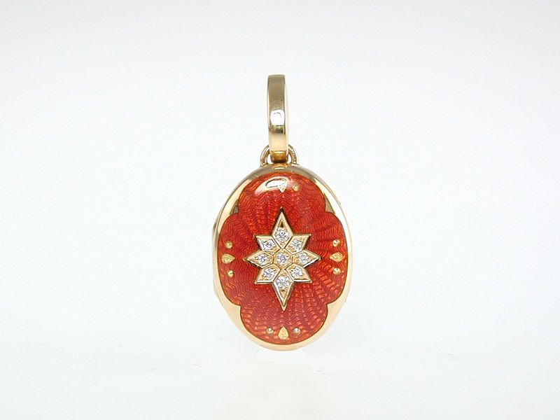 18kY RUST-COLORED ENAMEL LOCKET