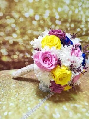 Ramos novia y madrina realizados con flores preservadas.