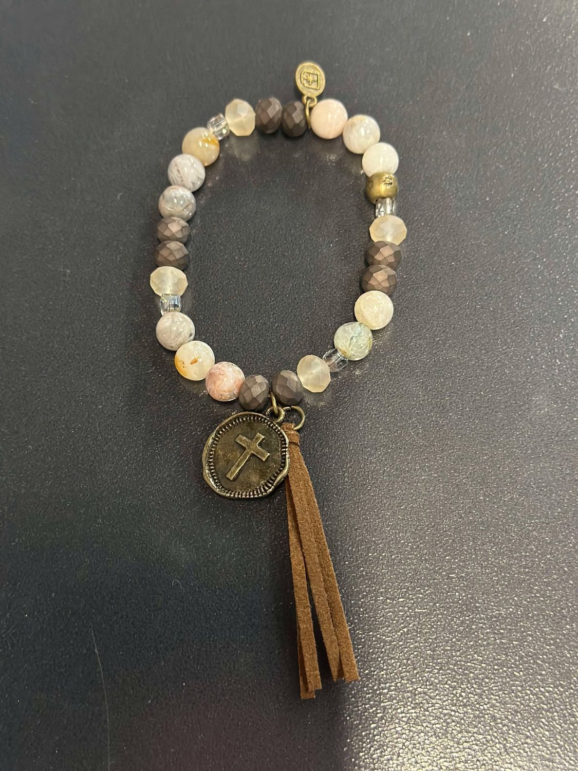 Light Colored Beads with Bronze Cross Medallion