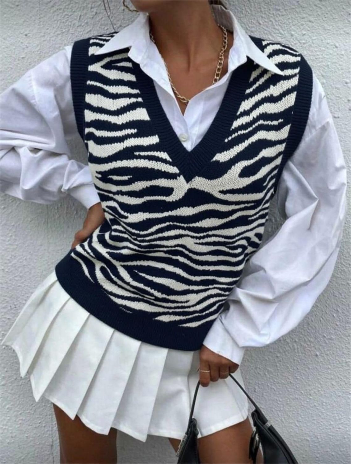 Pull sans manches noir et blanc