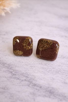 Clous d’oreilles Carrés