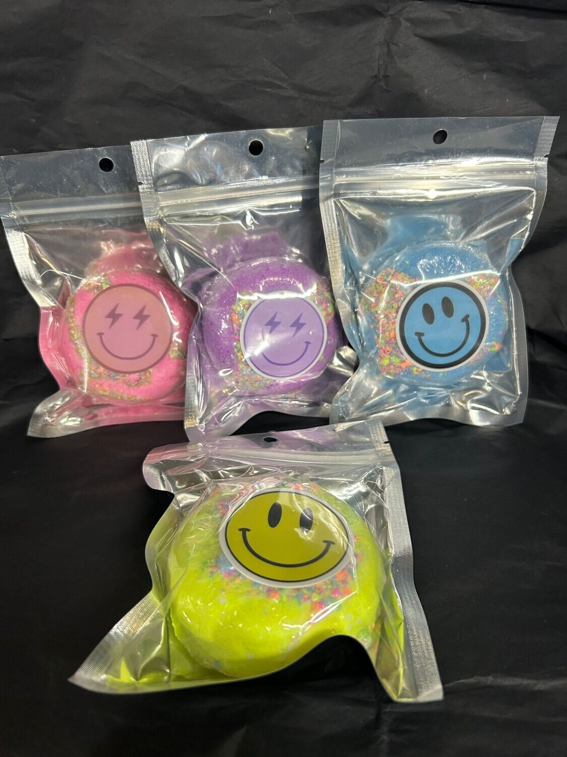 Bath bomb with waterproof sticker