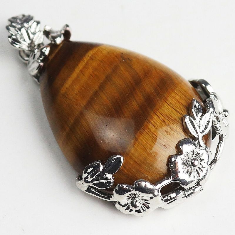 Quarts Tiger Eye tear drop stone necklace with chain.