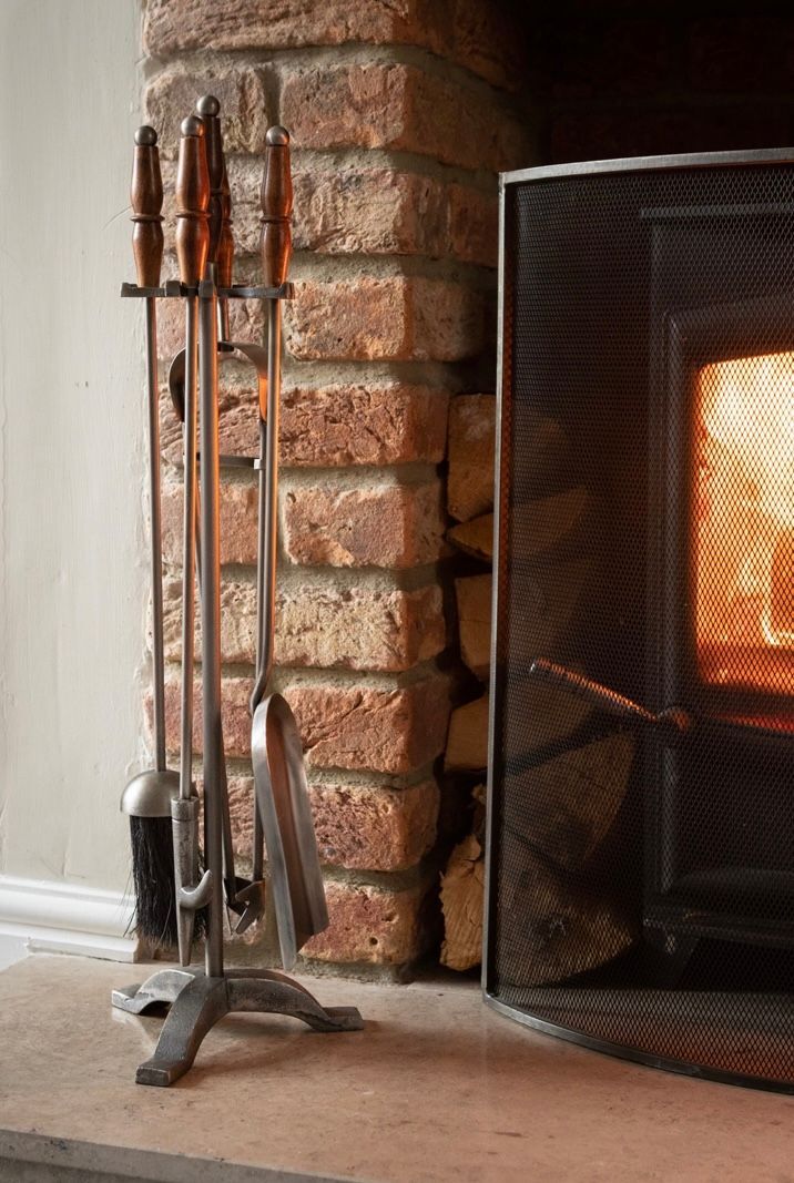 Hand Turned Fire Companion Set In Antique Pewter With Wooden Handles.