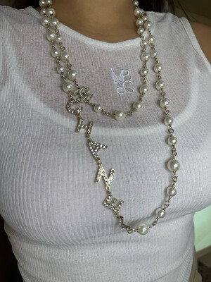 Collana perle scritta 