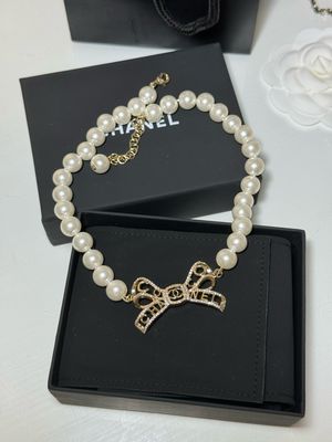 Collana perle fiocco