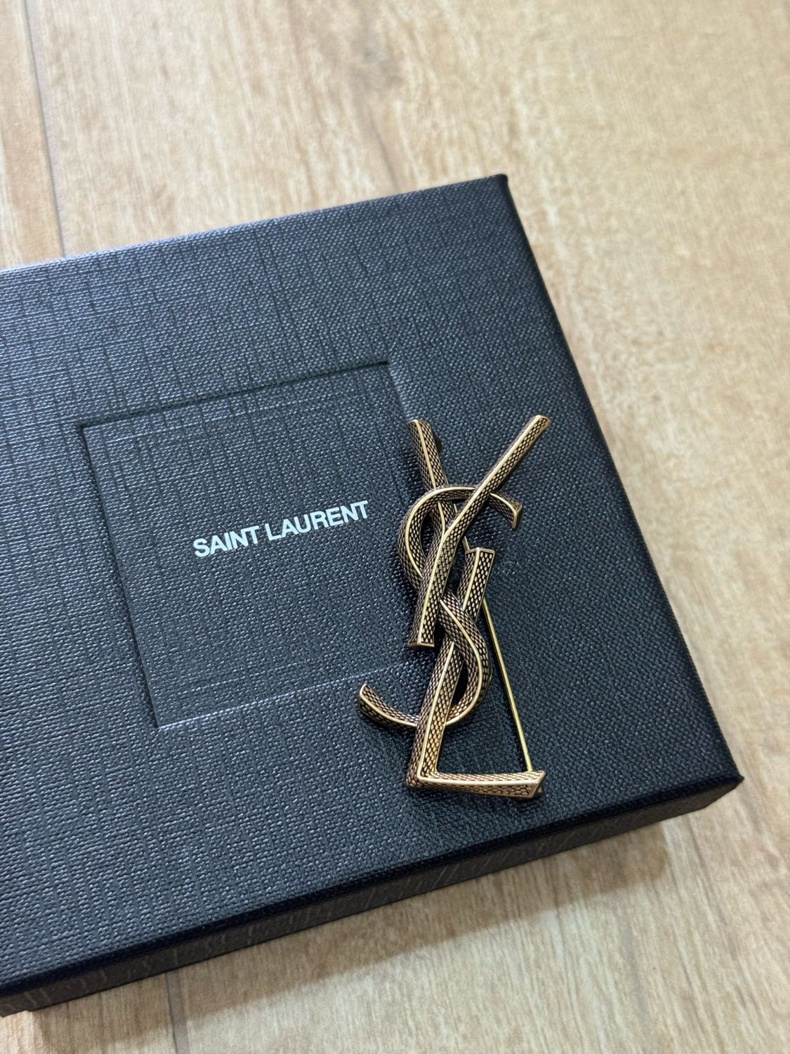Spilla Ysl bronzo