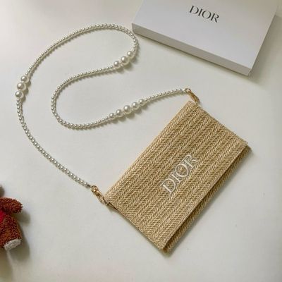Pochette mare con tracolla 