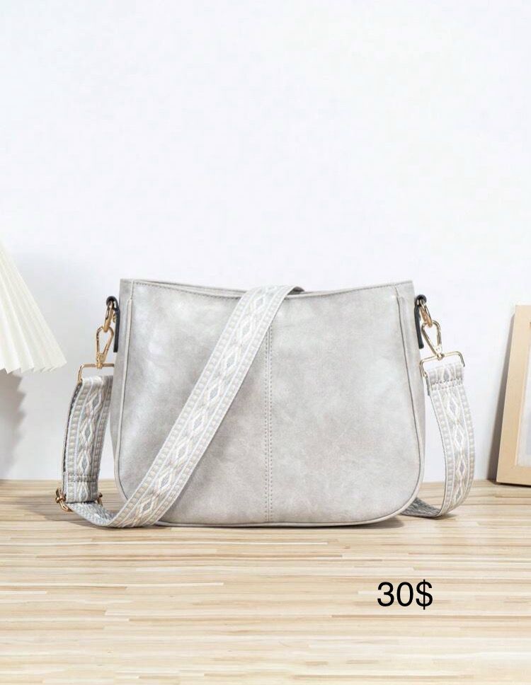 Bandolera gris