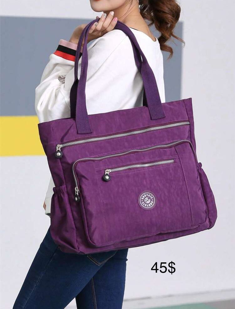 Bolso tipo Kipling morado