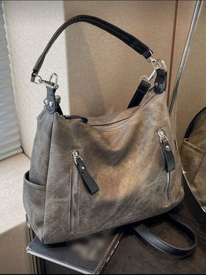 Bandolera gris