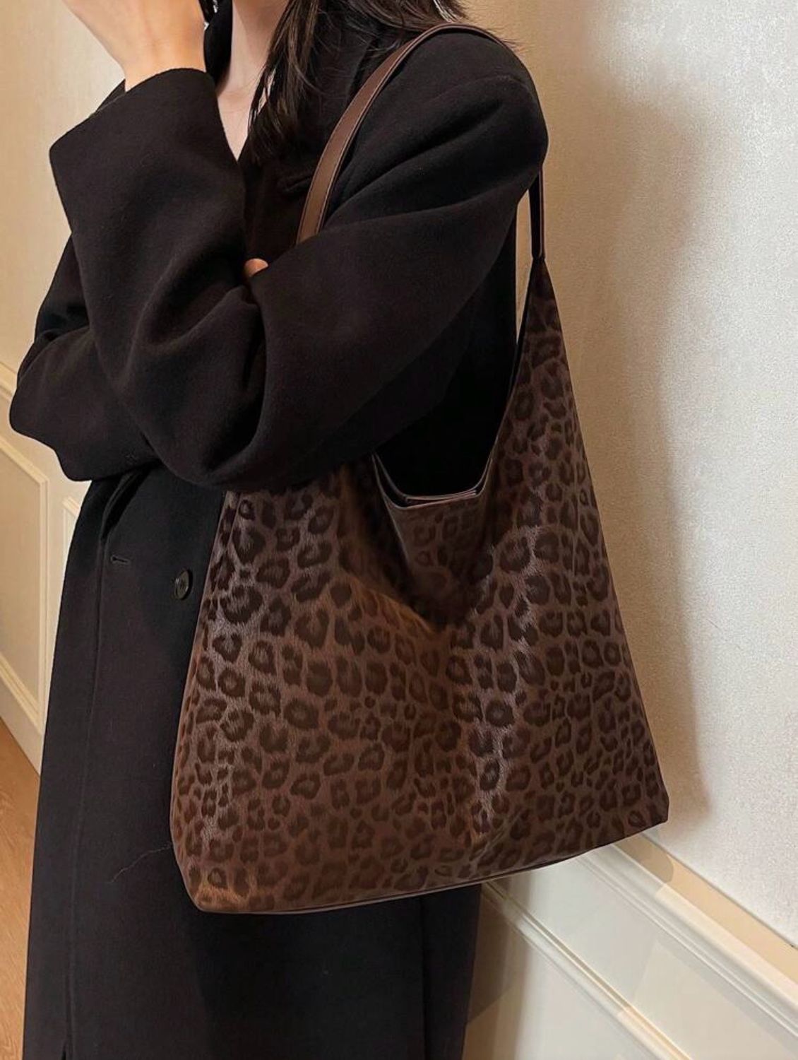 Cartera marrón animal print
