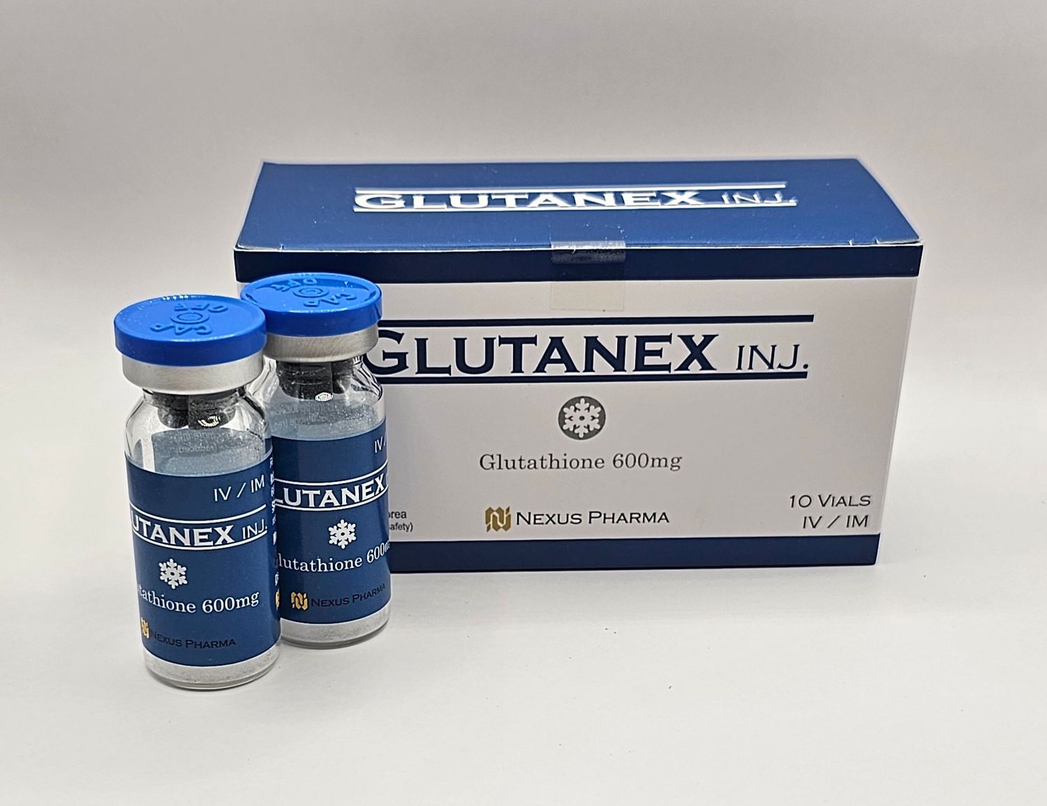 Two Glutathione 600mg vials in front of Glutanex box from Vitality Vitamin Vials