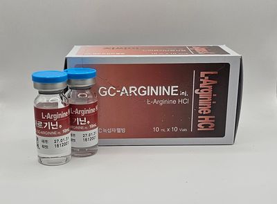 Two l-arginine vials in front of L-arginine box from Vitality Vitamin Vials