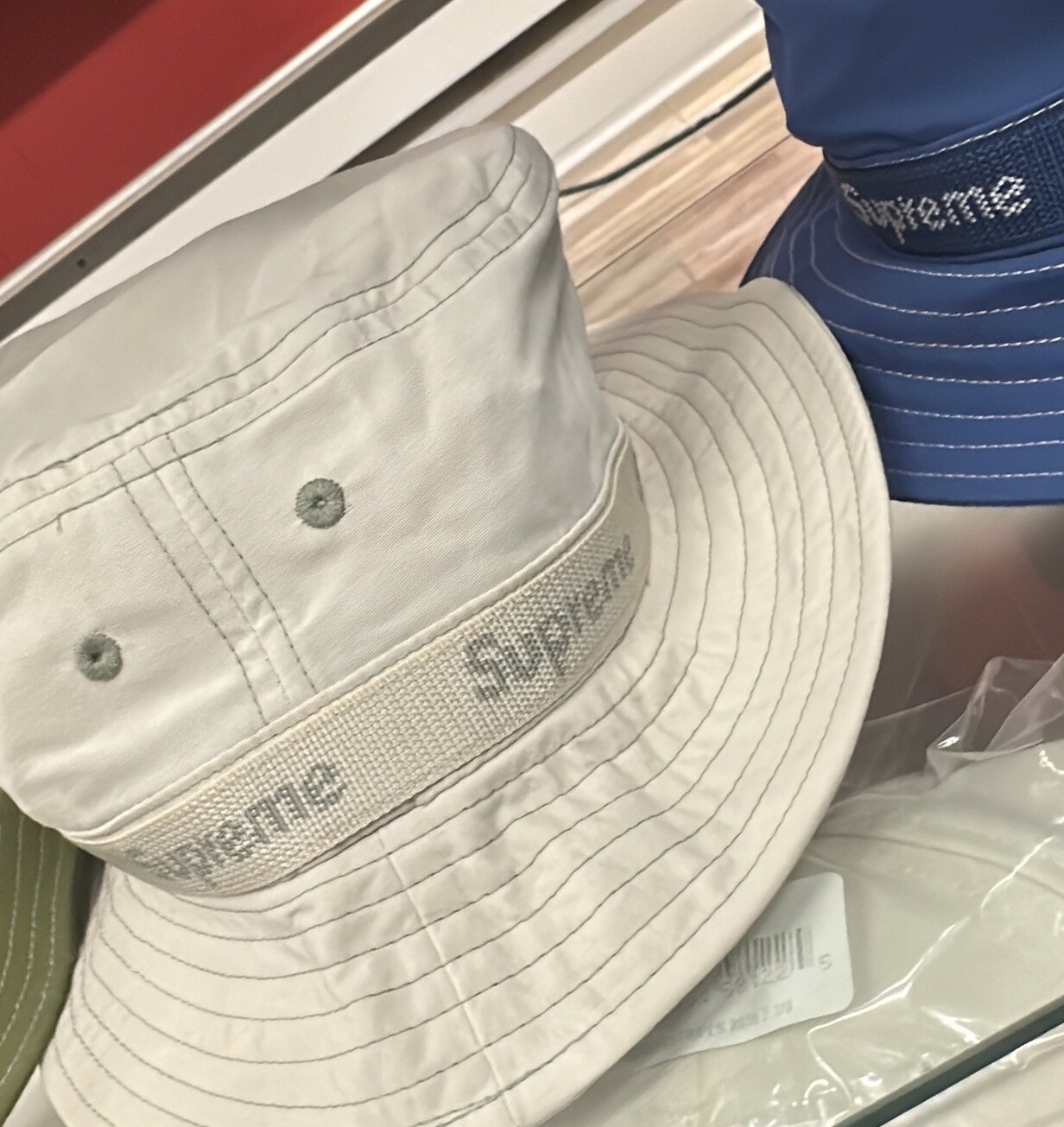 SUPREME TAN BUCKET BRAND STRIP