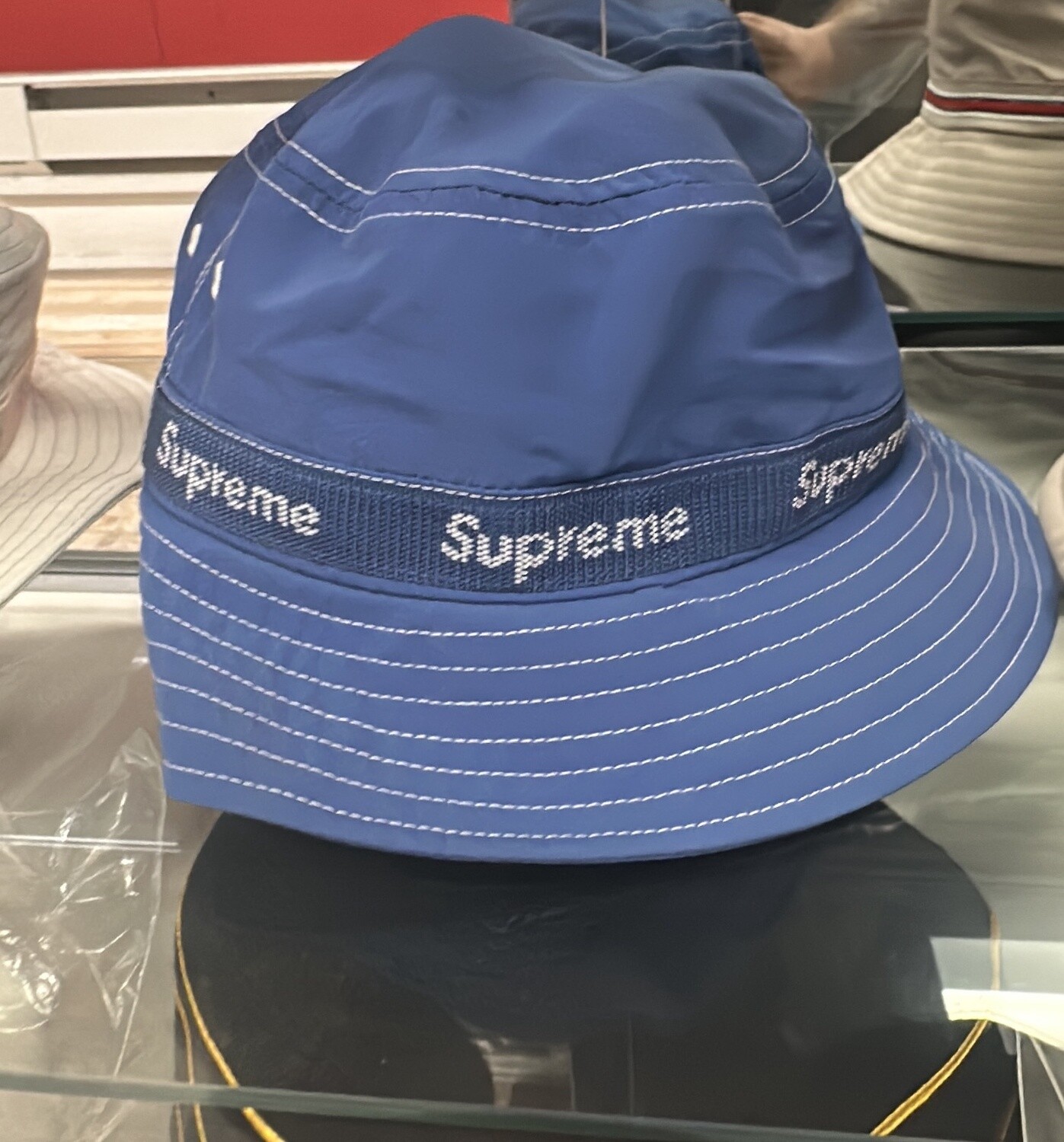 SUPREME BLU BUCKET BRAND STRIP (M/L)