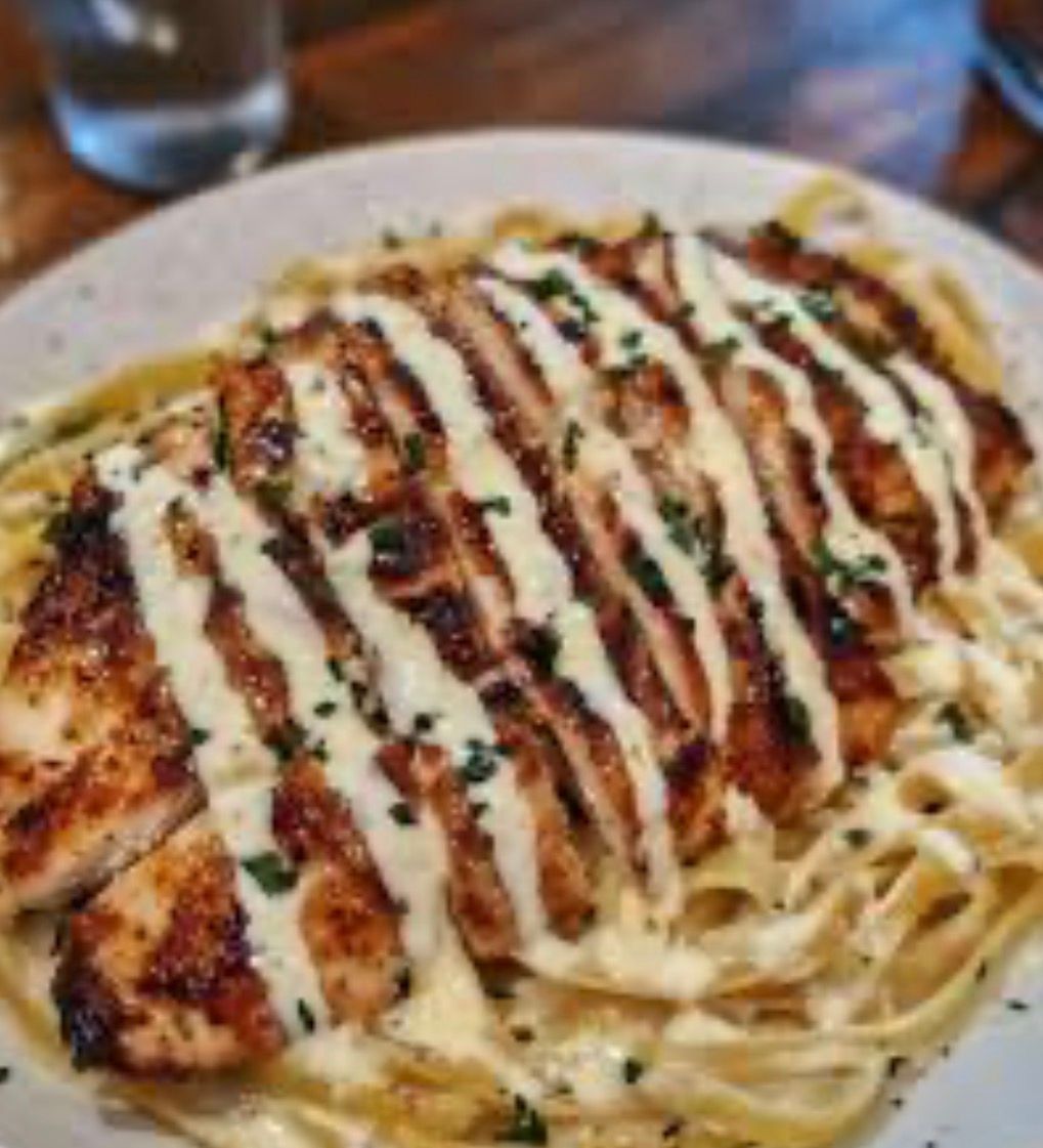 Pan Seared Tilapia Over Fettuccine Alfredo