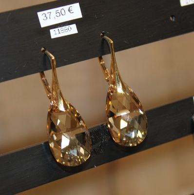 Boucles en argent plaqué or et cristal champagne