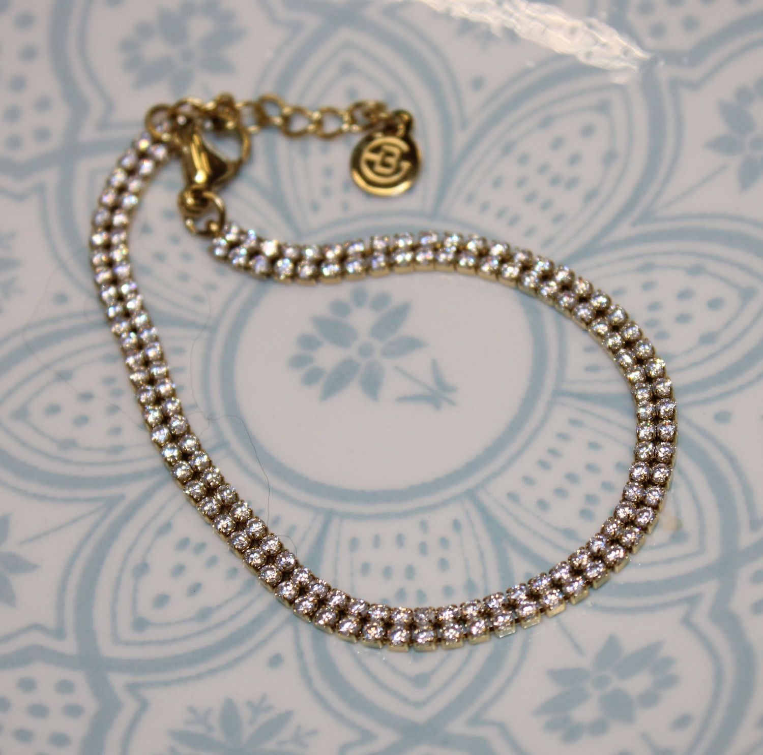 Bracelet brillant double en acier doré