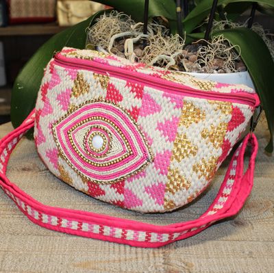 Sac banane rose à motif oeil brodé