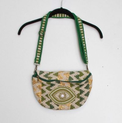 Sac banane vert à motif œil brodé