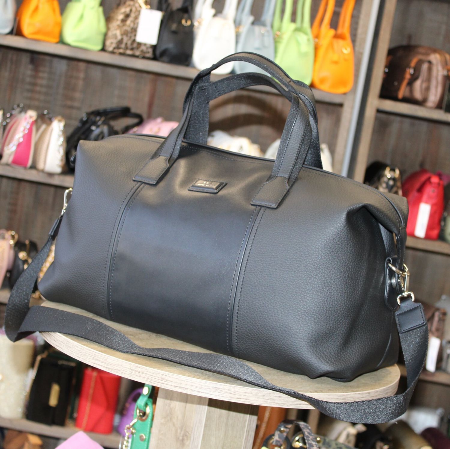 Sac de voyage en similicuir noir