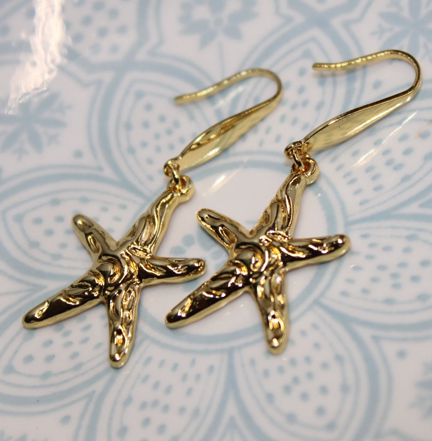 Boucles d&#39;oreilles &quot;ETOILE DE MER&quot; en acier