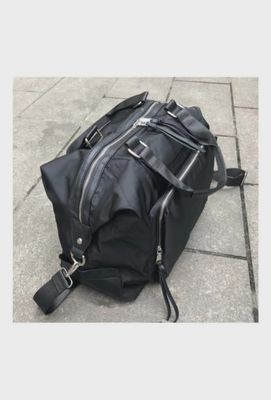 Sac de voyage en similicuir et nylon