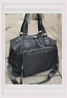 Sac de voyage en similicuir et nylon