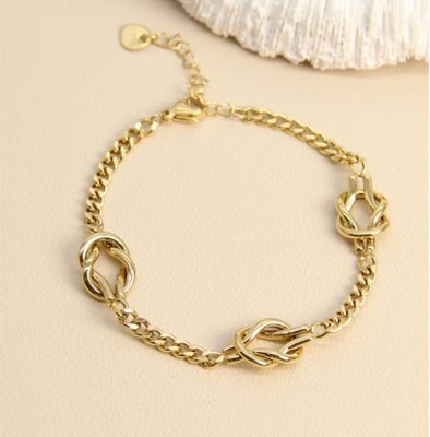 Bracelet maillons entrelacés en acier inoxydable doré