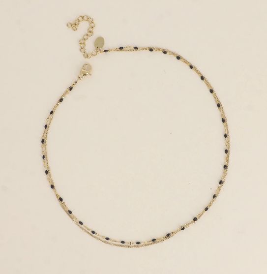 Bracelet/ras de cou en acier doré et détails noir