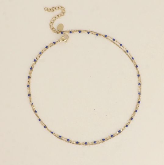 Bracelet/ras de cou en acier doré et détails bleu