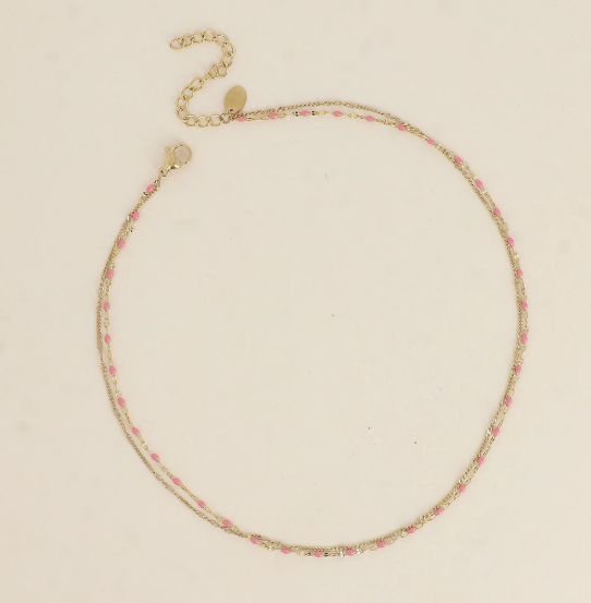 Bracelet/ras de cou en acier doré et détails rose