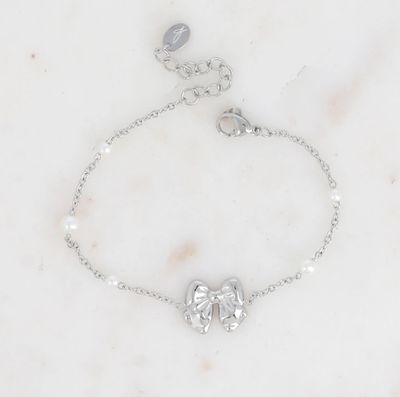 Bracelet en acier avec nœud papillon et perles synthétiques
