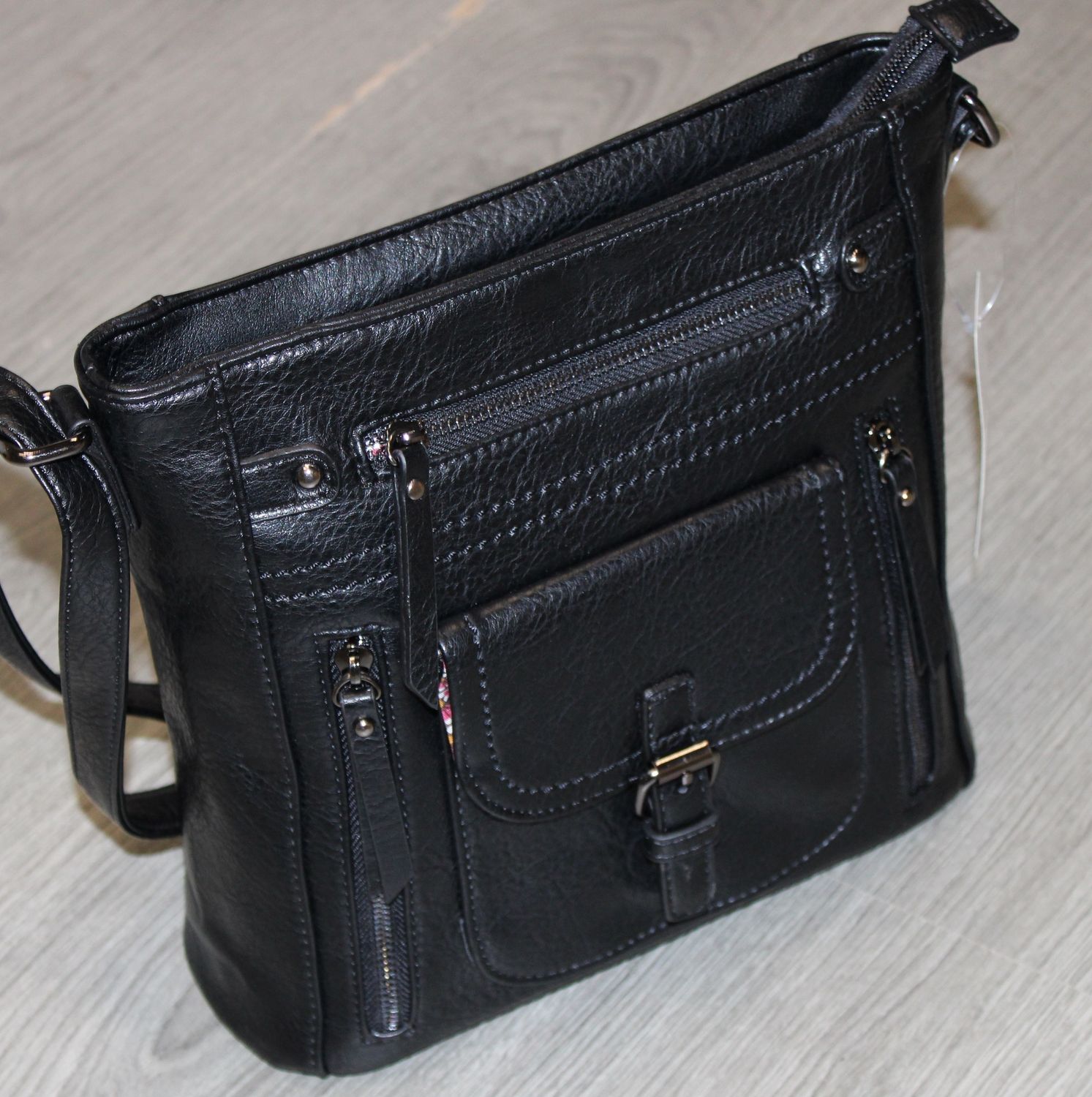 Sac bandoulière multipoches en similicuir noir