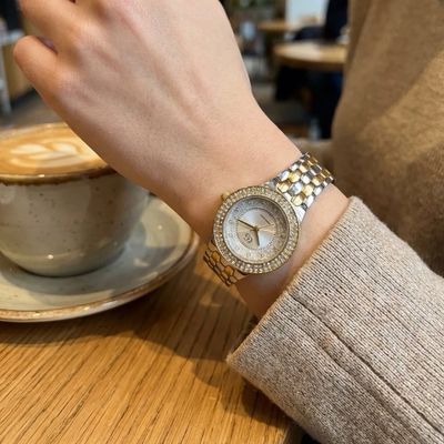 Montre en acier inoxydable bicolores avec strass et paillettes